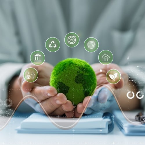 A green earth with eco-friendly icons on a table, symbolizing sustainability and ESG principles